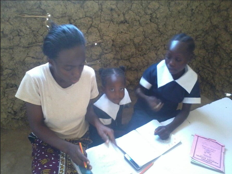 Principal Priscillah Masha teaching